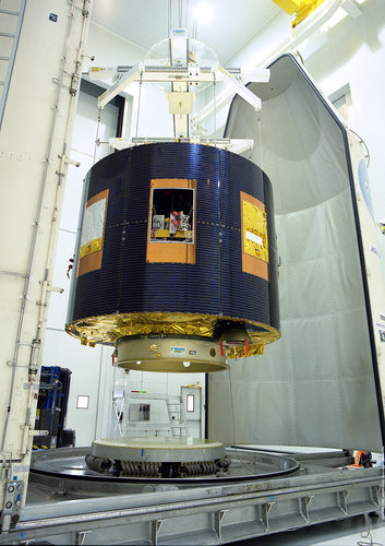 MSG's payload fairing half-shells are moved into position around MSG-1
