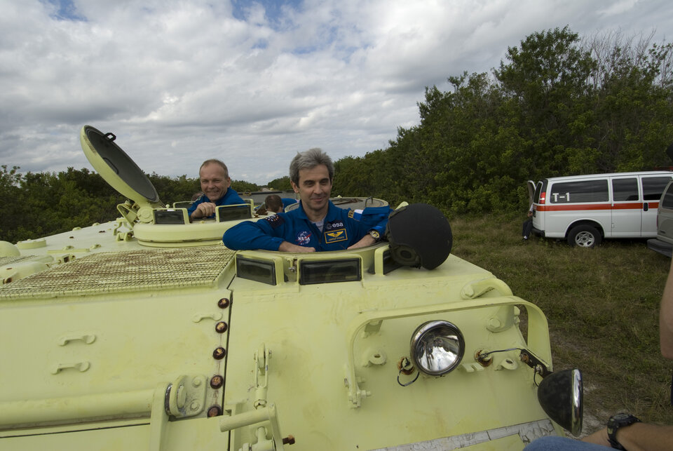 Hans Schlegel and Léopold Eyharts during emergency evacuation training at Kennedy Space Center, Florida