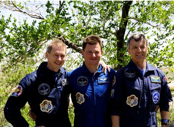 The Soyuz TMA-15 crew take part in the traditional tree-planting ceremony ahead of their launch to the ISS