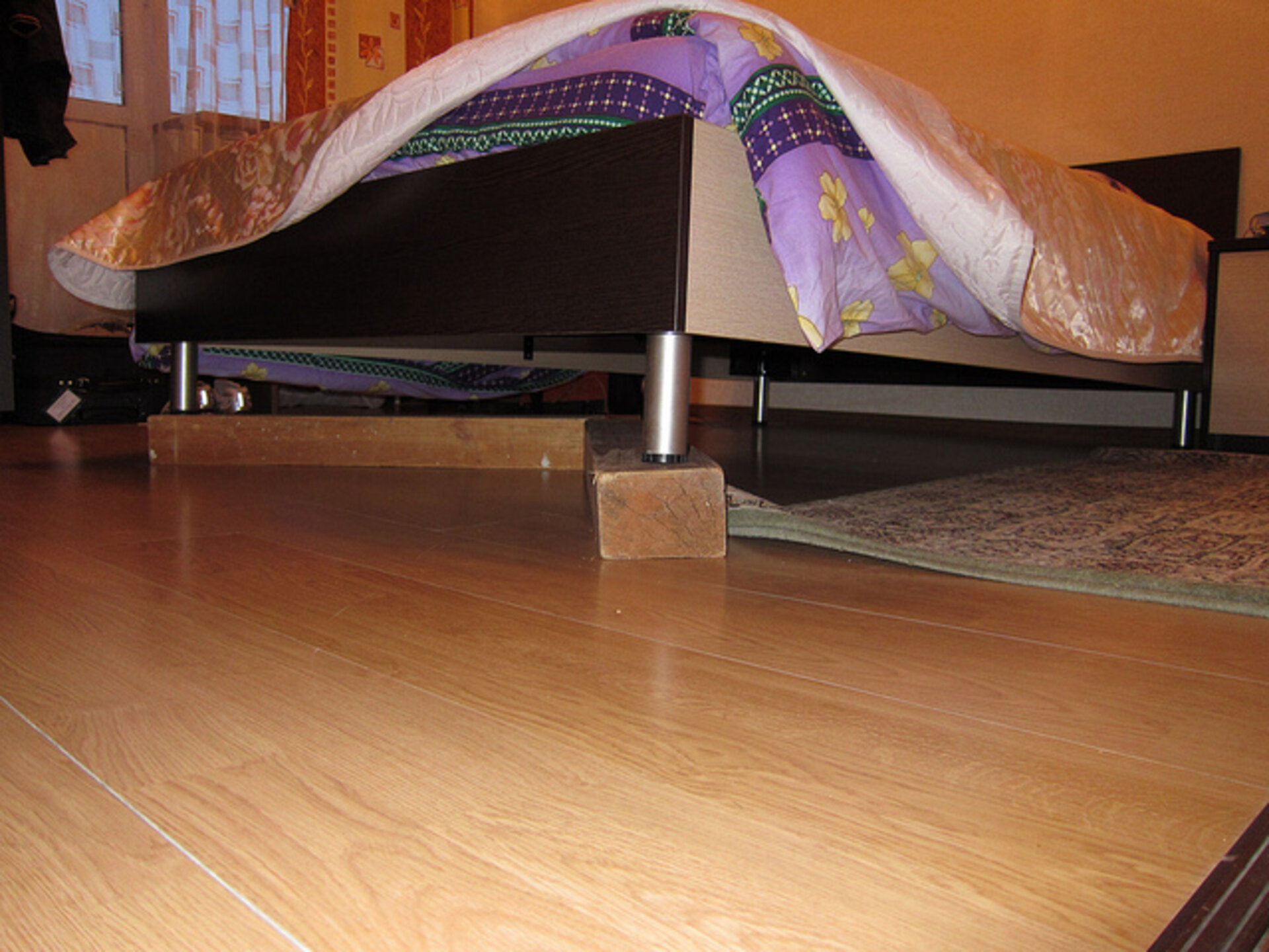 Wooden blocks under the bed