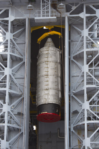 Swarm upper composite hoisted to the top of the service tower 