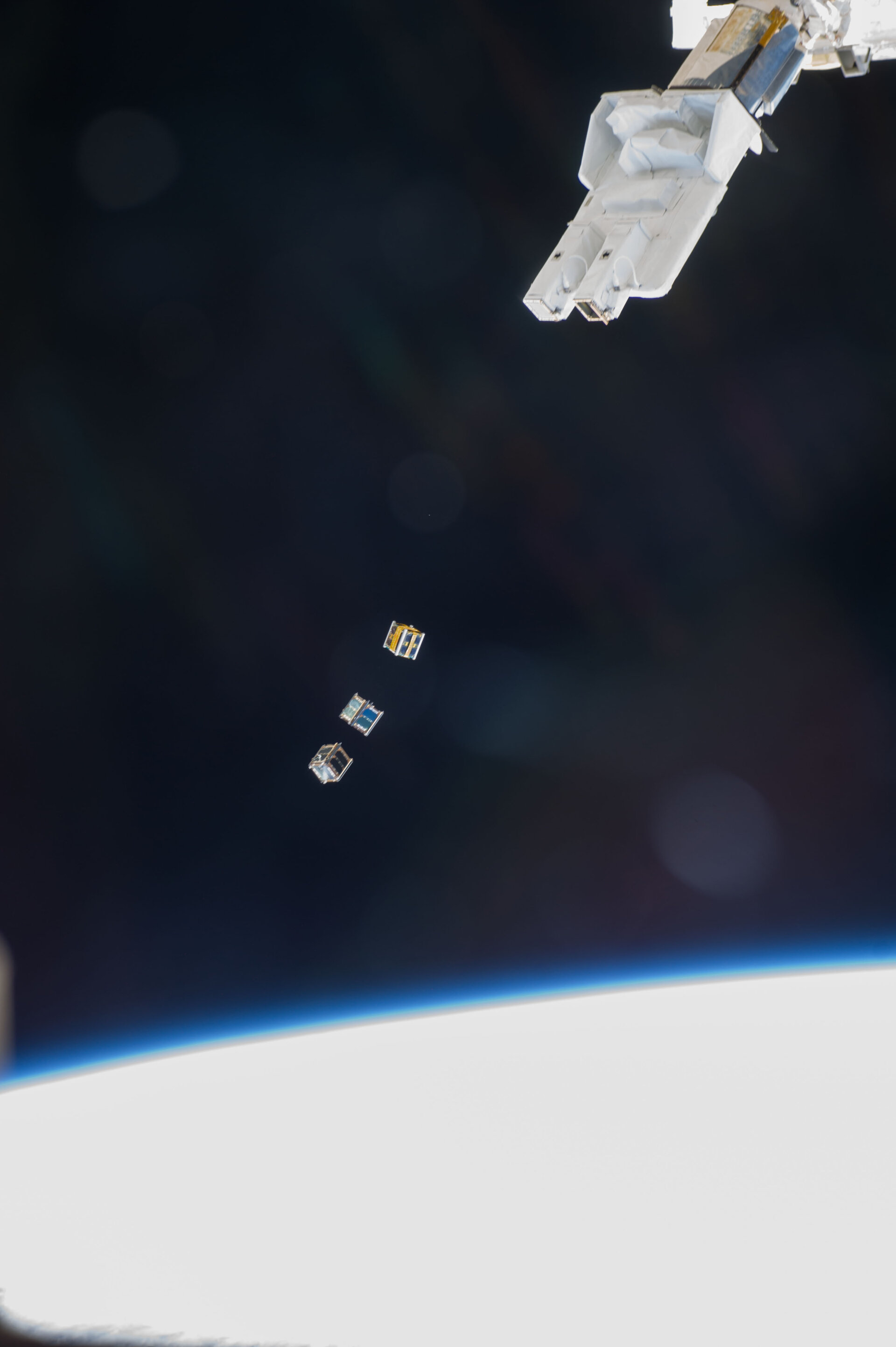 CubeSats leaving dispenser