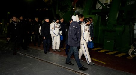 Expedition 50 crewmembers walking to the launch pad