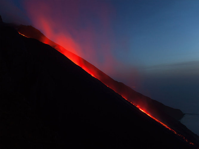 A stream of lava flowing down the slopes of Italy’s Stromboli volcano