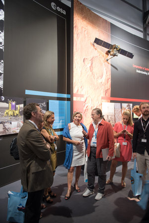 Isabelle Duvaux-Béchon shows Dominique Tilmans the ESA Pavilion