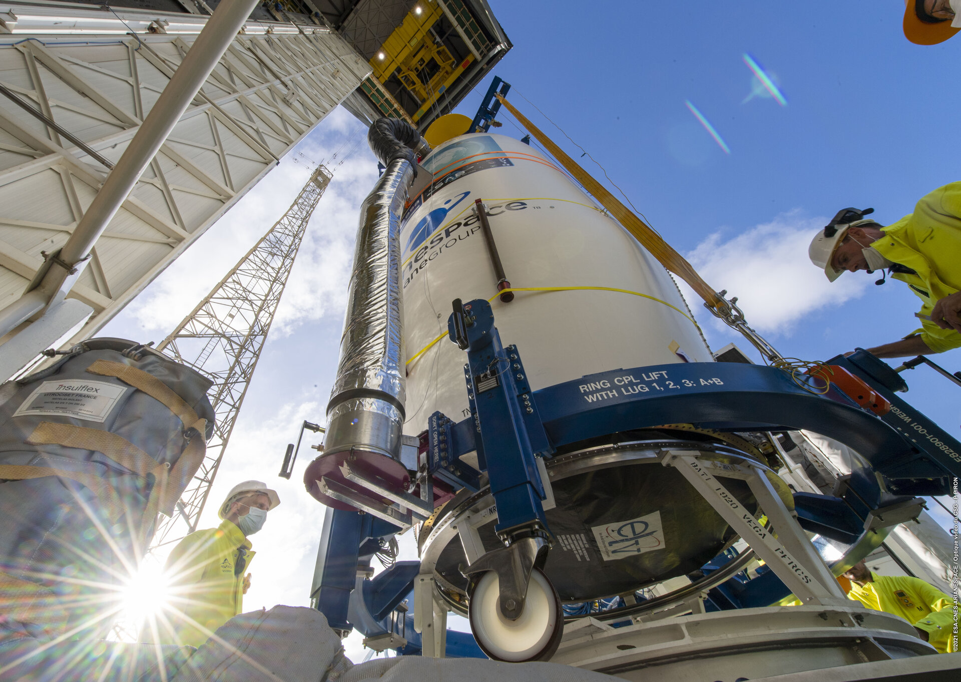 Preparations to hoist Vega's fairing to the top of the mobile gantry for integration with the launch vehicle