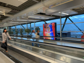 ESA Christmas poster on a digital screen at Schiphol airport, Amsterdam, December 2023.