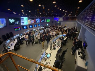 The Hera team assembles inside the Main Control Room