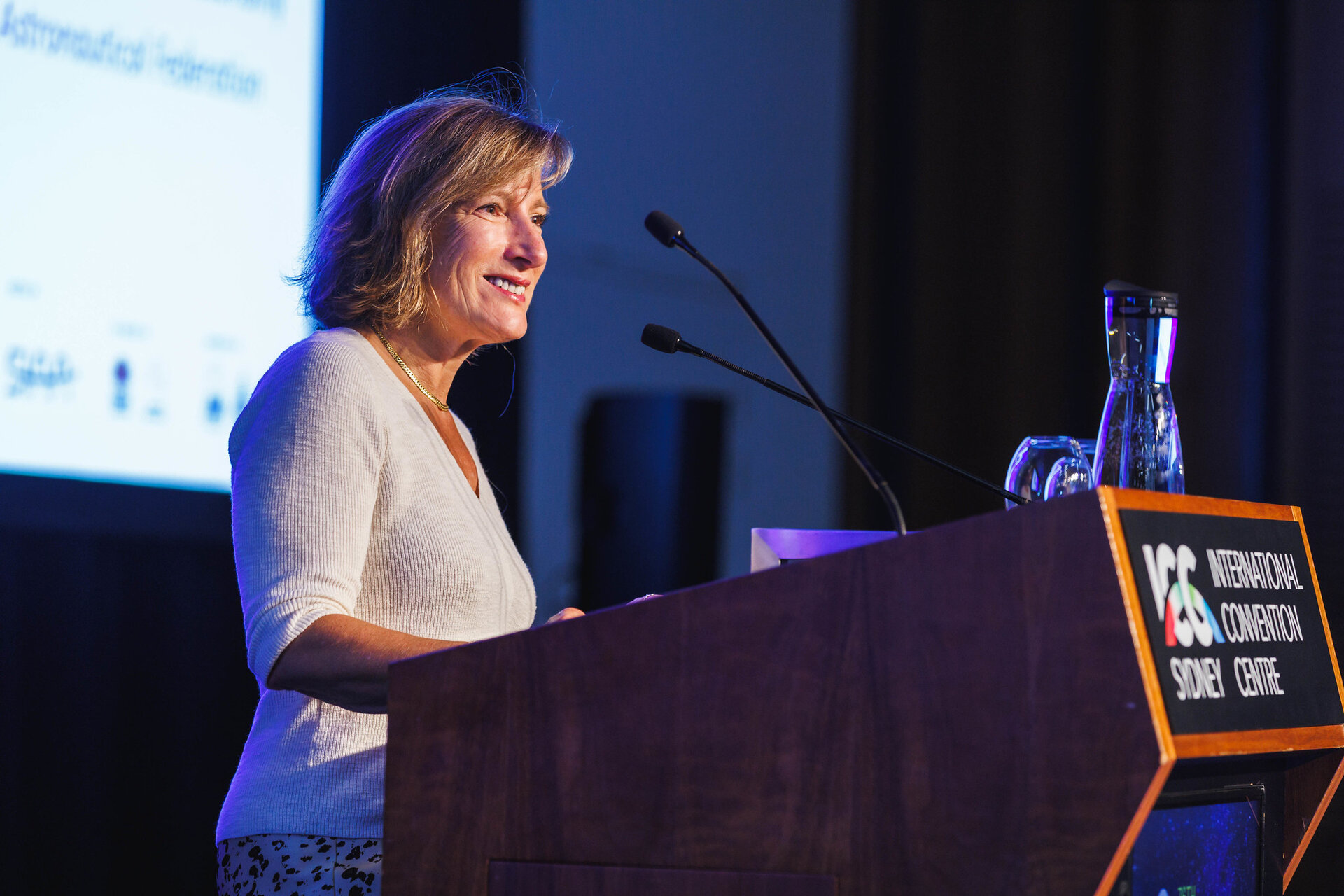 ESA Director of Commercialisation, Industry and Competitiveness Géraldine Naja addresses industry leaders at IAC's Industry Luncheon 2025. 