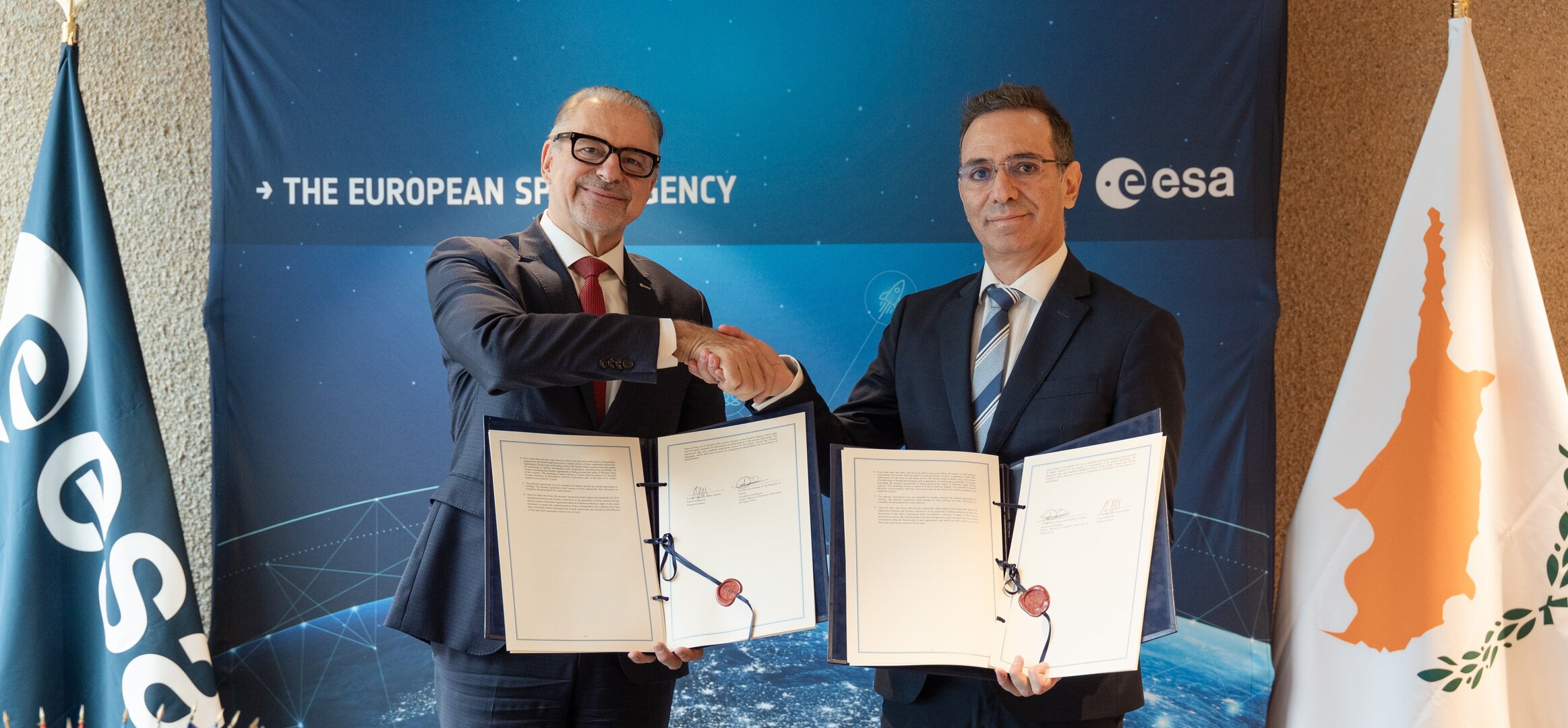 ESA Director General Josef Aschbacher and Nicodemos Damianou, Deputy Minister of Research, Innovation and Digital Policy of the Republic of Cyprus sign the agreement in Paris. 