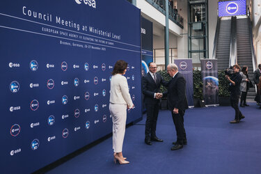European Commissioner Andrius Kubilius is greeted by Dorothee Bär, Federal Minister of Research, Technology and Space, Germany and ESA Director General Josef Aschbacher.