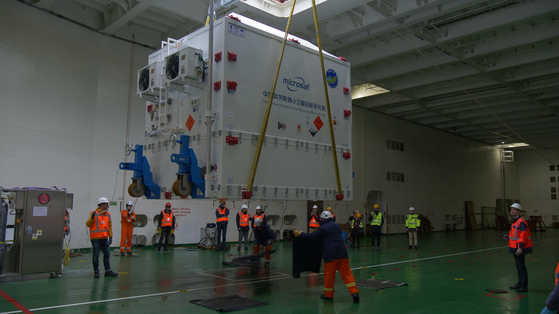 Smile is loaded into a ship at the Port of Amsterdam