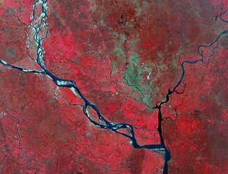 These two views from Copernicus Sentinel-2 reveal the landscape transformation in the area around Dhaka, the capital of Bangladesh.