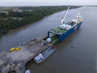 Smile exits the boat that carried it to French Guiana